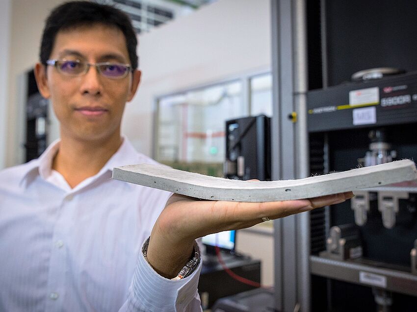 NTU Assistant Professor Yang En-Hua shows the flexible concrete, which his team has developed